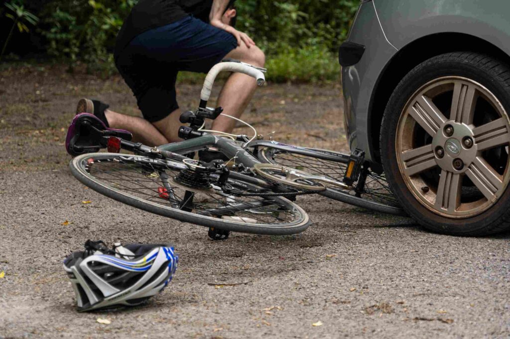 A cyclist in an Accident with a Car.