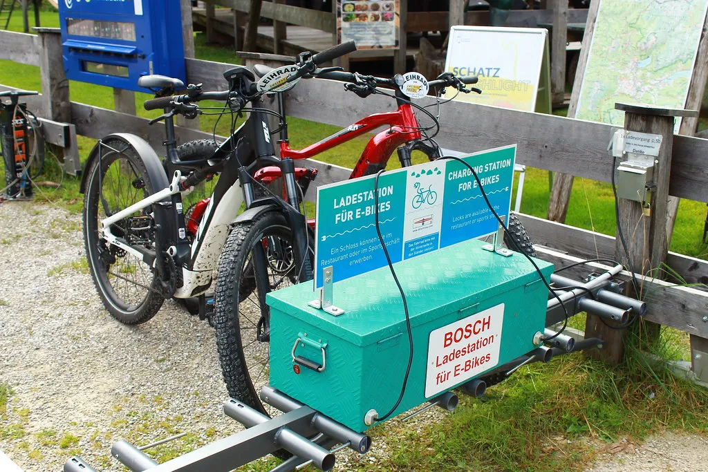 Two Bicycles at an E-bike Charging Station
