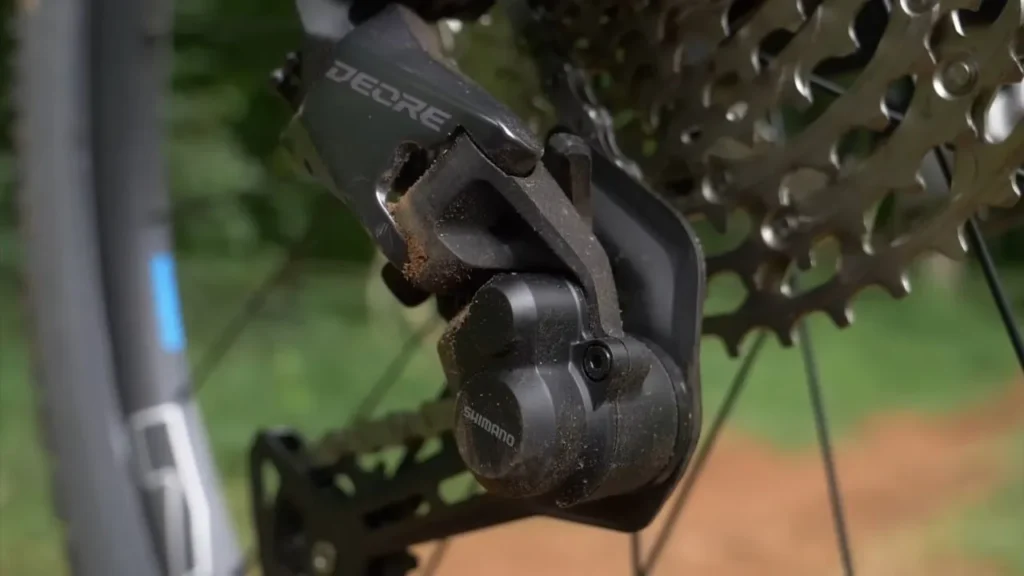 Shimano deore rear derailleur with chainrings closeup image on my mtb