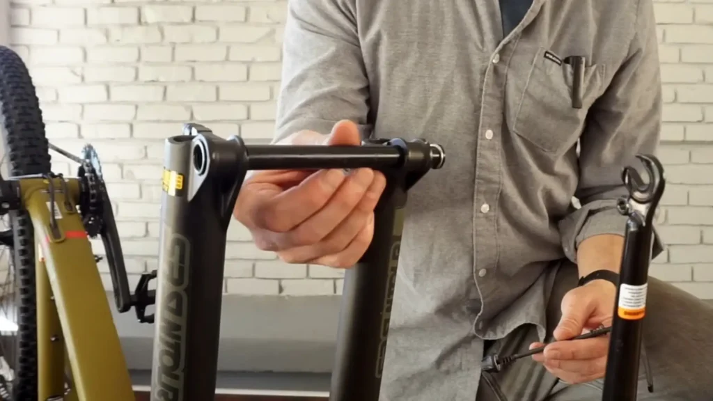 installing thru axle in the bike fork openings